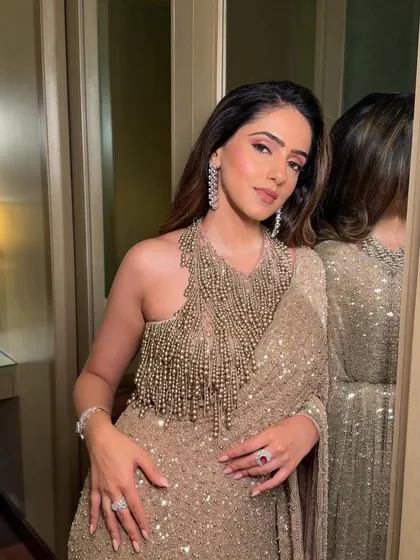 This is what I call full-on glamour. I styled these soft, cascading waves to complement the client's incredible sequined saree and beaded blouse, creating a head-turning look perfect for a wedding reception or a high-end party.