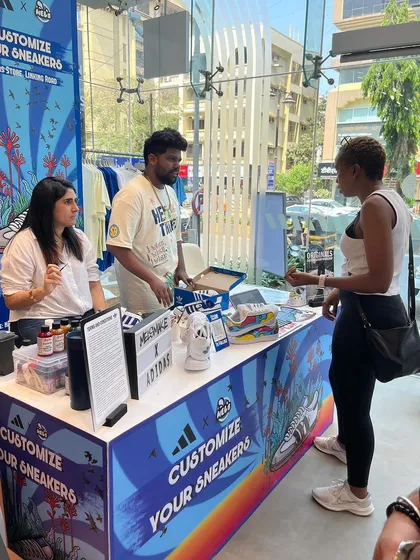 Our live art setup is a hub of activity. We engage with each guest to understand their vision, whether it's a simple initial or a complex design, making the customization process a core part of the event experience.