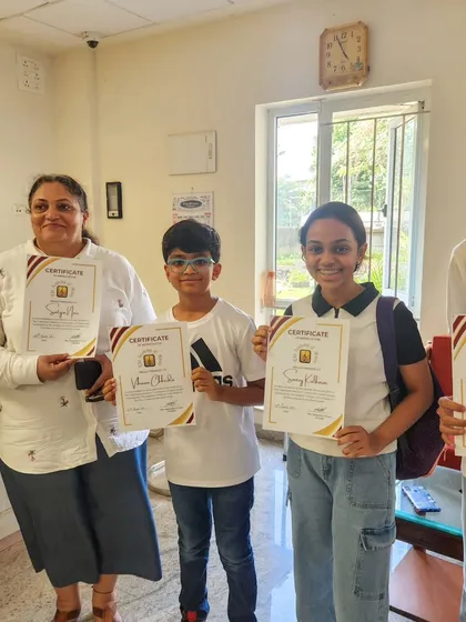 A group of our students and a teacher celebrate a successful performance. We are a community of musicians, and we are proud of every single participant.