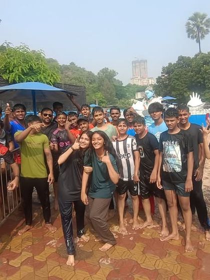 A day full of memories at Surja Waterpark. A large group of our happy students posing for a picture after a fun-filled day of slides and swimming.