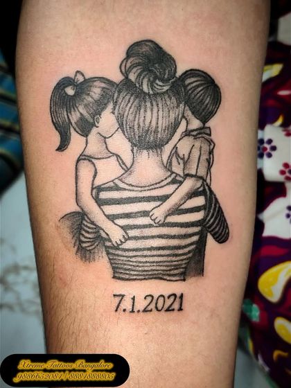 Here is another beautiful piece celebrating a mother's love, showing her embracing her two children. We also included a special date to make it even more personal.