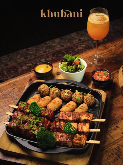 Why settle for one dish? Our Garden Bounty Platter is loaded with sizzling paneer tikka, grilled vegetables, and flavorful dips for a vegetarian feast.