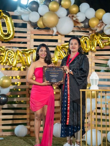 Celebrating the success of a dedicated student on her graduation day.