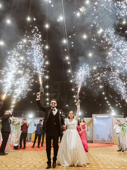 A couple's entry is the first big moment of the reception, and it has to be spectacular. For Ryan and Ela, we created this electrifying entrance with perfectly timed cold pyro guns, turning their walk-in into a show-stopping memory for everyone present.