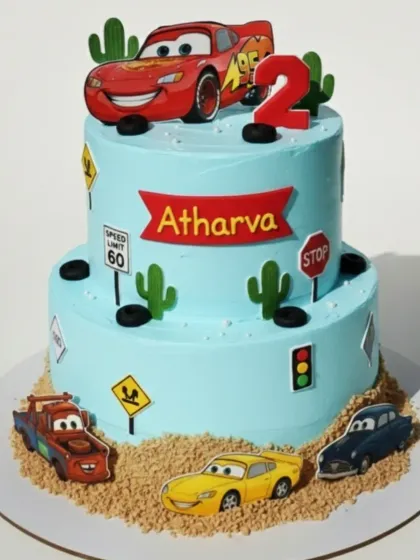 For this two-tier Cars themed cake, I combined a fresh pineapple flavor with detailed, fun decorations. It’s a great example of how I can build an exciting world around a popular character theme, all completely from scratch and without preservatives.