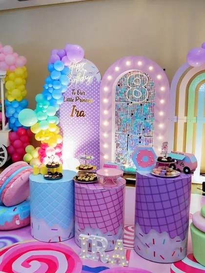 We love when a theme comes to life. This vibrant candy land setup for Princess Ira's 8th birthday was a dream to photograph. We make sure to capture the full scale of the decor you have worked so hard to create, providing a complete visual story of the event.