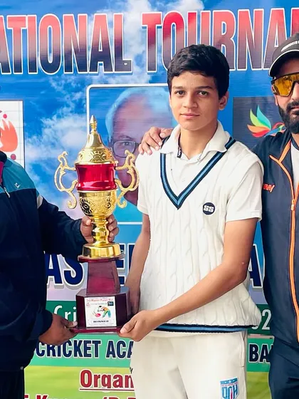 Presenting the championship trophy to Daksh Khandelwal, the Man of the Series in the Third Master Puranmal Tournament. His consistency was outstanding.