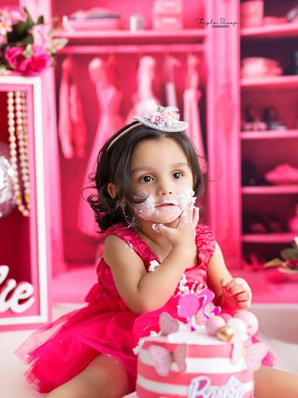 A close-up of the messy aftermath. These are the funny, memorable moments that families love to look back on from their baby's first birthday cake smash.