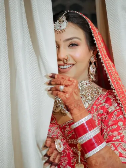 There's a special kind of magic in the moments just before you walk down the aisle. I love capturing that playful anticipation, the beautiful smile of a bride ready to meet her forever. This shot, with the soft light and genuine joy, is a perfect example of a timeless bridal portrait.
