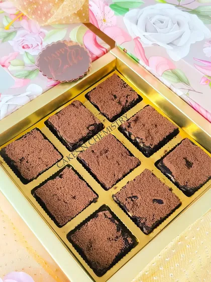 A simple yet elegant box of my fudgy brownies, dusted with cocoa powder, from the Rakhi 2023 collection. It's a classic gift that's always appreciated.
