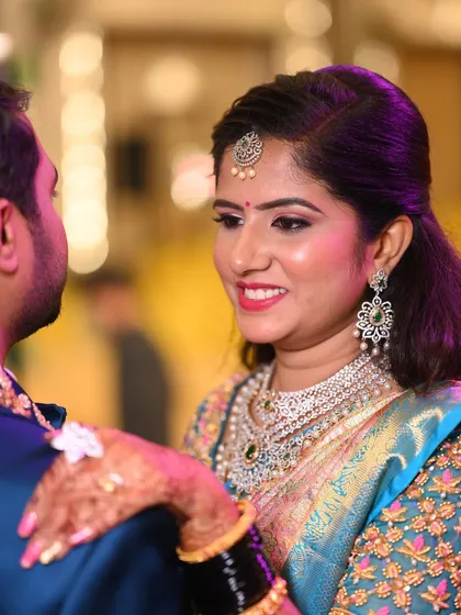 A close-up of Rashmi's happy expression. The makeup enhances her natural beauty and radiance.