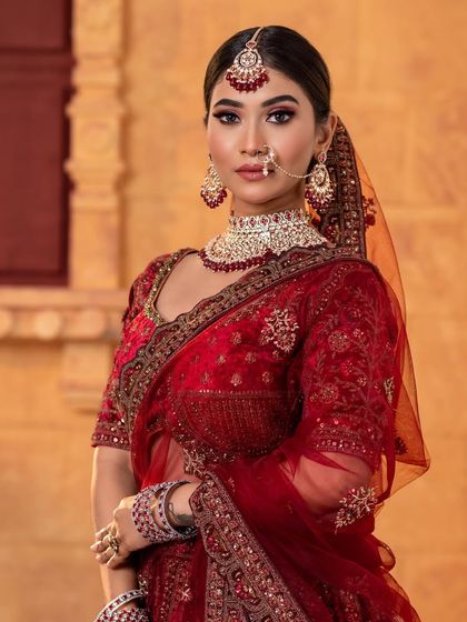 A North Indian bridal look in a stunning red velvet lehenga, a key style covered in my course.