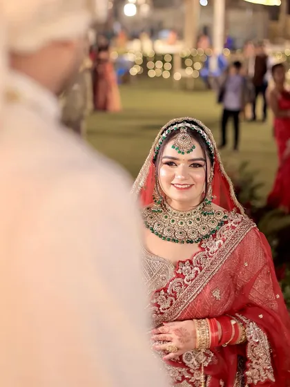 A classic shot of the bride looking towards the groom, capturing a moment of love and anticipation.