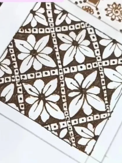 A practice swatch of a floral grid pattern, a beautiful filler for bridal designs.