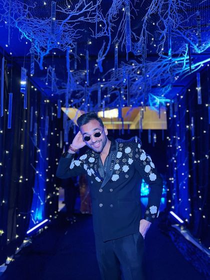 A candid shot from the Sangeet night in Thailand. My goal is to look sharp and feel great, so I can bring my best energy to the stage.