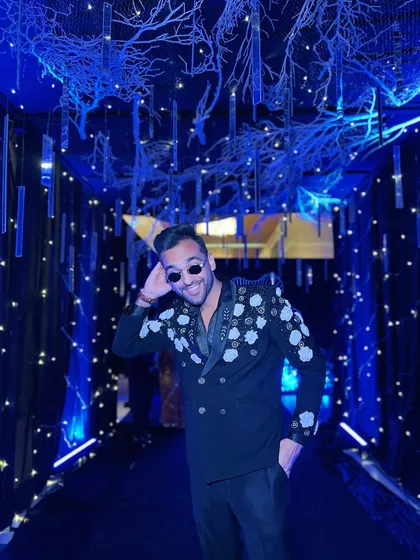 A candid shot from the Sangeet night in Thailand. My goal is to look sharp and feel great, so I can bring my best energy to the stage.