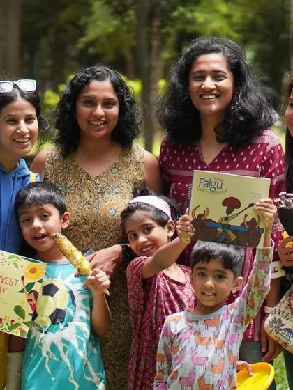 A group of mothers and their children posing after our 'Farm to Plate' session. These gatherings are a great way for parents to connect with each other.