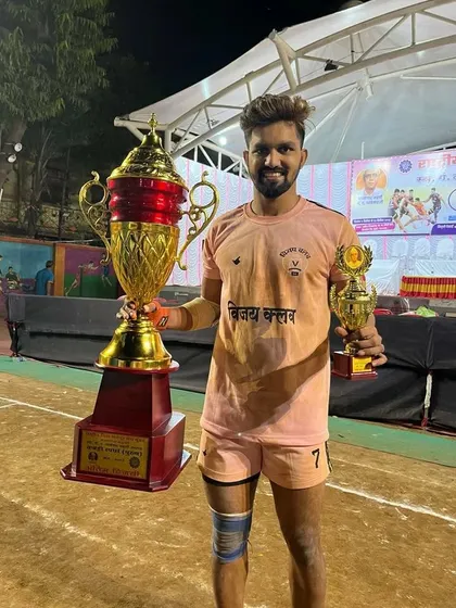 Raj Natekar with both the team championship trophy and his individual 'Best Player' award.