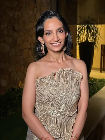 This client is the picture of modern sophistication, ready for her evening event. The makeup is subtle yet impactful, creating a polished and timeless look.
