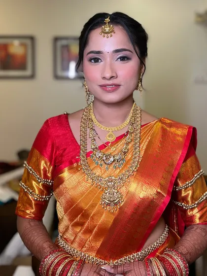 My beautiful South Indian bride, looking absolutely radiant for her wedding rituals. I focused on creating a dewy, luminous complexion that enhances her natural glow.