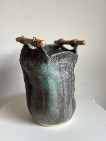 This sculptural vase with bamboo handles just left for its new home. It's always a little sad to see a favorite piece go, but I'm so happy it will be enjoyed.