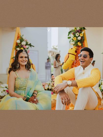 A candid portrait of the bride and groom laughing during their haldi ceremony. Their relaxed and happy expressions perfectly capture the joyful spirit of the event.