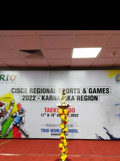 A view of the stage and ceremonial lamp at the CISCE Regional Taekwondo competition. It was a proud event for our academy.