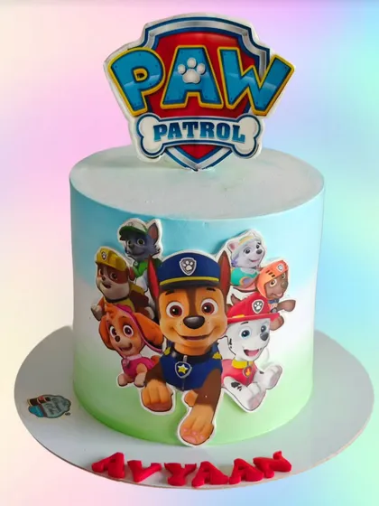 A clean and modern Paw Patrol cake with an airbrushed ombre effect. This design is perfect for a stylish take on the popular cartoon theme.