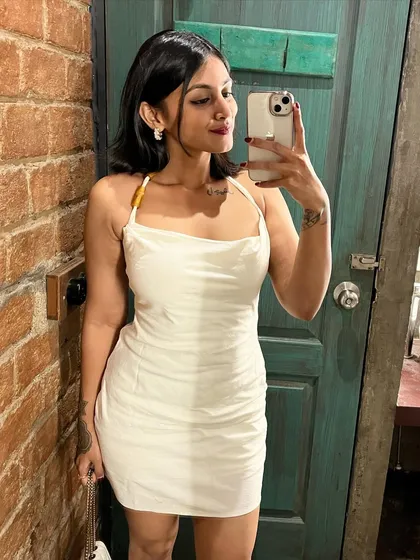 Another angle of the white dress. It's a versatile piece that can be dressed up with heels or down with sneakers.