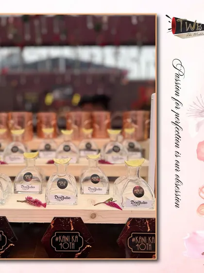 A dedicated Don Julio tequila station, featuring mini bottles and custom coasters. This is a great way to highlight a premium spirit and offer a specialized tasting experience.