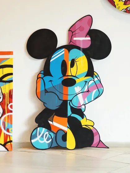 A full shot of the 55-inch tall Minnie Mouse 3D artwork. The abstract graffiti patterns give a modern twist to a classic character, all hand-painted on layered wood.
