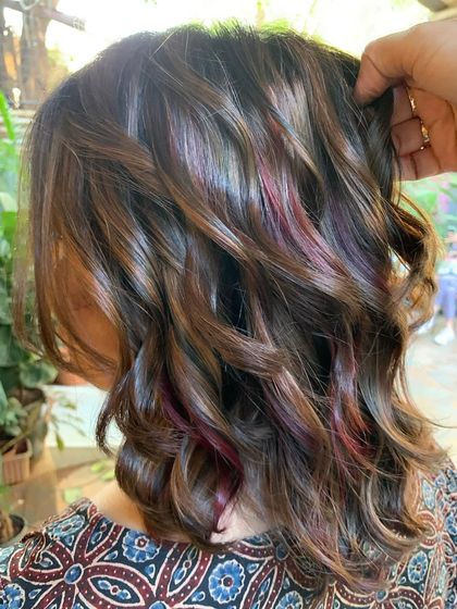 A side view of the plum, hazelnut, and chocolate hair. The colors are so rich and dimensional. (No filter)