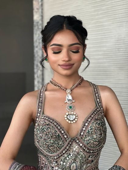 A beautiful Mehendi look with soft smokey eyes and a braided hairstyle. This is a great example of a complete look taught in my online masterclass.