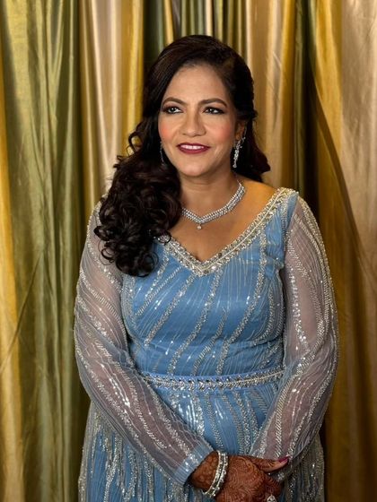 Another angle of this stunning party glam, showing how the makeup enhances her features and gives her a confident, radiant glow.