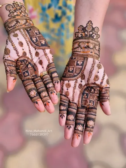 A stylish Indo-Arabic design with hanging lotus motifs and checkered patterns. The negative space helps the intricate details stand out.