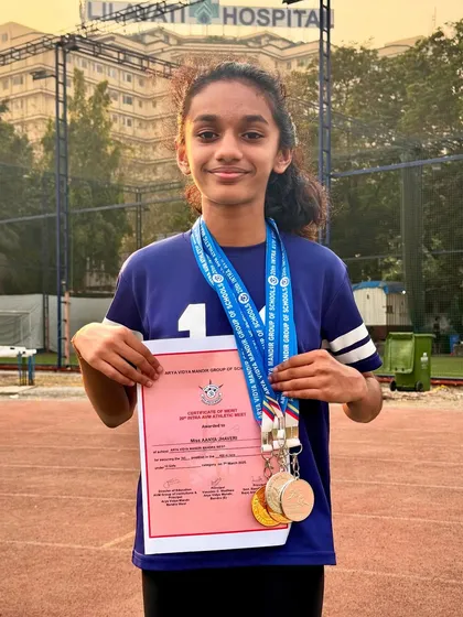 Aanya Jhaveri with an amazing collection of medals after her school's annual athletic meet. She won two golds and two silvers, showcasing her versatility and hard work.