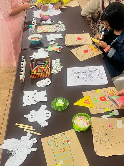 A look at our puppet making station, all set up for a fun event. We offer a variety of puppet crafts, including paper bag puppets, stick puppets, and more.