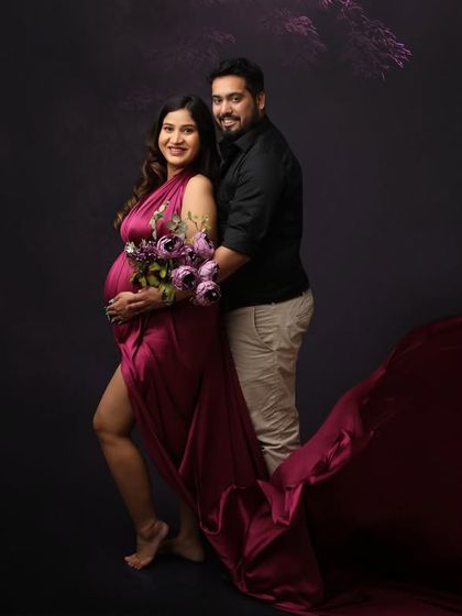 On this winding trail, we celebrate the graceful transition to parenthood together. This couple portrait captures a moment of shared joy and support.