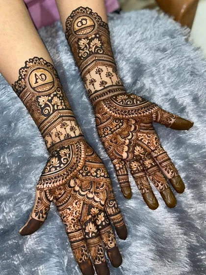 Another view of the engagement mehendi with personalized initials. The design is a perfect blend of modern personalization and traditional Indian henna art.