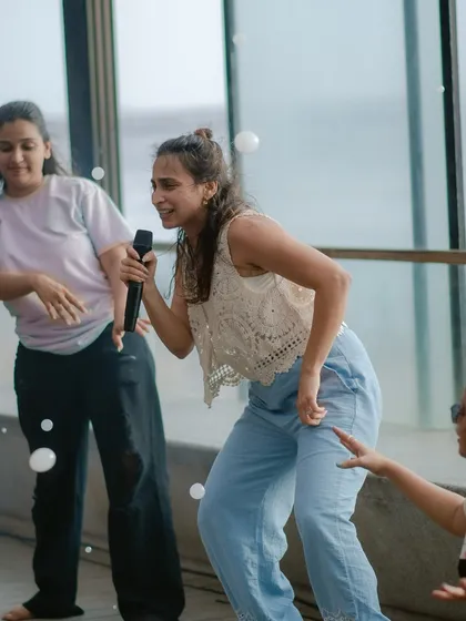 As the lead instructor, my job is to bring the energy and make sure everyone feels comfortable. Using a mic for larger groups, we guide you through simple choreography, making the session feel more like a party than a class.