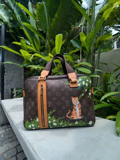 Here's the finished Zen Tigress bag in a natural setting. The goal is always to create art that feels like it was meant to be on the accessory from the start.