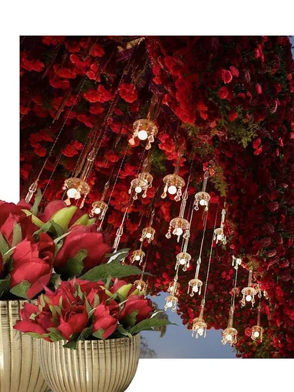 A close-up of the hanging red rose installation with crystal elements. This kind of intricate floral work is our specialty.