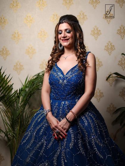 A serene, eyes-closed pose that conveys a sense of quiet elegance and satisfaction.