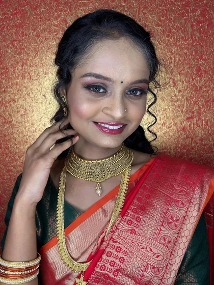 A portrait of the final look. The makeup is natural and enhances her beautiful features, especially her expressive eyes.