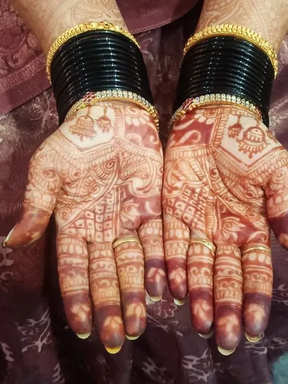 Here you can see the beautiful, rich reddish-brown stain that my homemade organic henna leaves after the paste is removed. This deep color is the result of using 100% natural ingredients, ensuring it's safe for your skin and looks stunning for your special day.