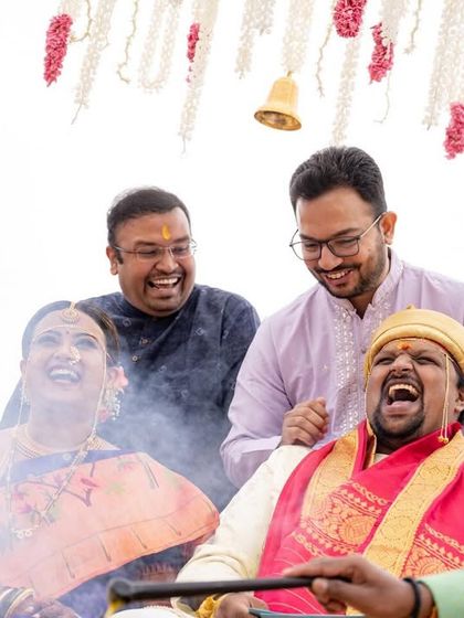 Laughter and fun during the wedding rituals, capturing the candid joy of a destination celebration.
