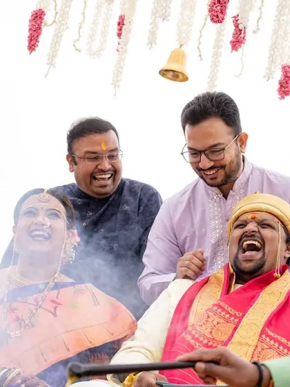 Laughter and fun during the wedding rituals, capturing the candid joy of a destination celebration.