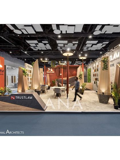 The Trustlam '23 exhibition space was conceptualized around the idea of a 'Flame of Trust'. We designed abstract lamp-like structures that served as both architectural elements and product displays, creating an open, sculptural field.