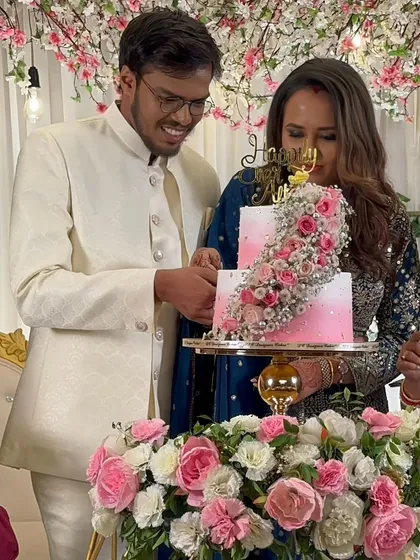 The cake cutting moment, a beautiful tradition. This two-tier pink ombre cake was the perfect sweet ending to their celebration.