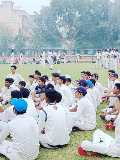 The young players are all ears during a briefing. We teach them to be attentive and eager to learn.